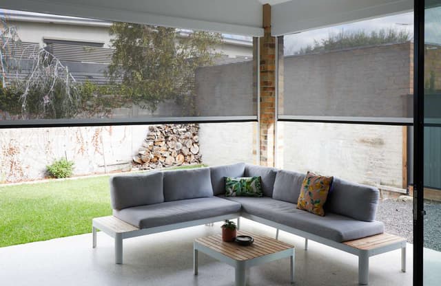 Double roller blinds installed in a Miami home — Coastline Blinds