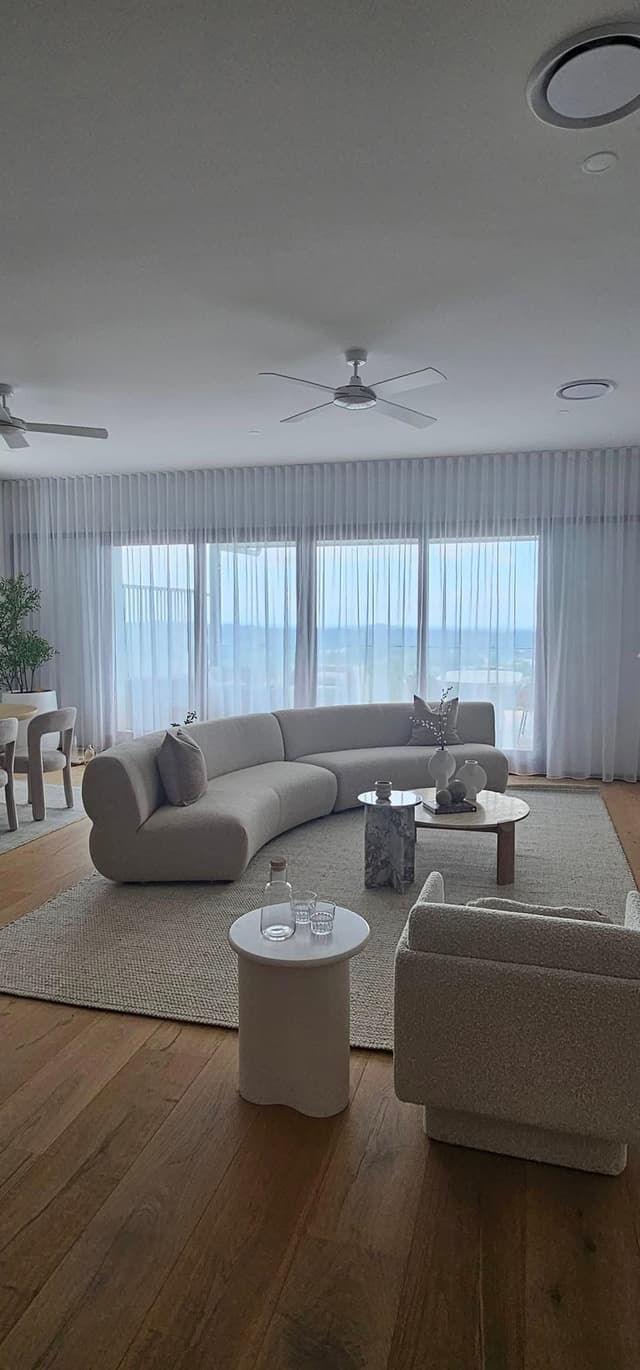 Wave fold sheers installed in a Mermaid Waters home — Coastline Blinds