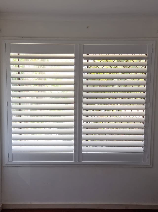 Timber Venetians installed in a Broadbeach Waters home — Coastline Blinds